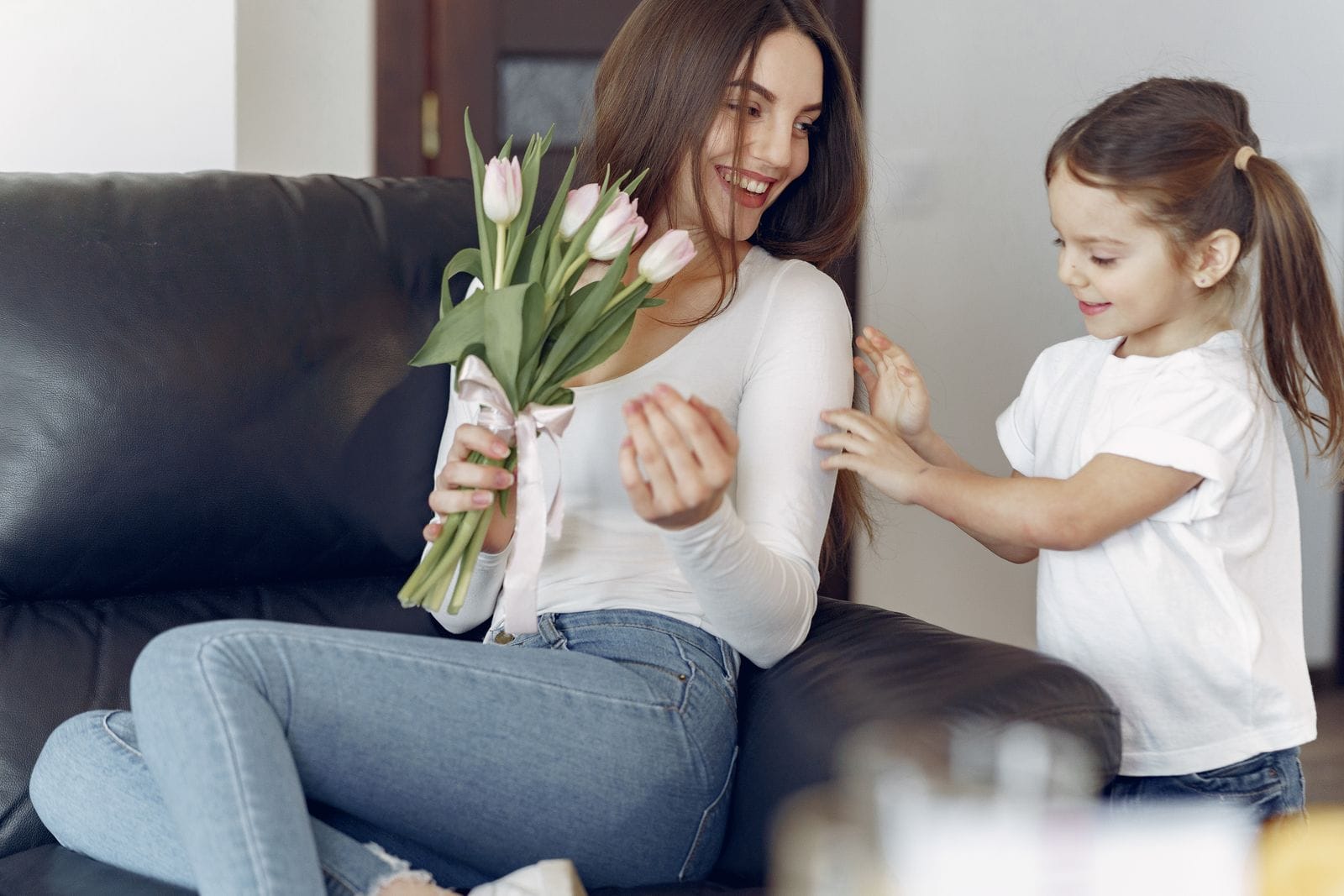 Mother and daughter with flowers - Mother's Day group transport