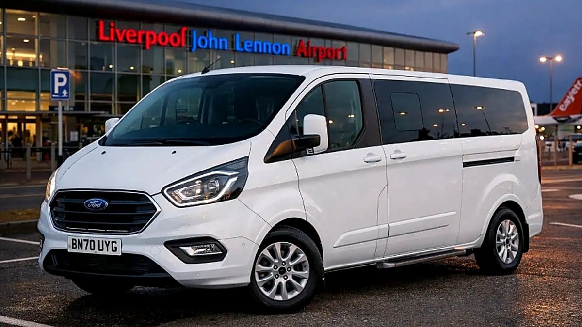 White minibus ready for a John Lennon Airport group transfer